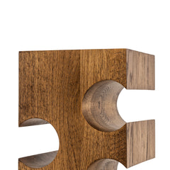 Close up view of the solid wood wine rack for twelve bottles on a white background highlighting the natural oak wood grain