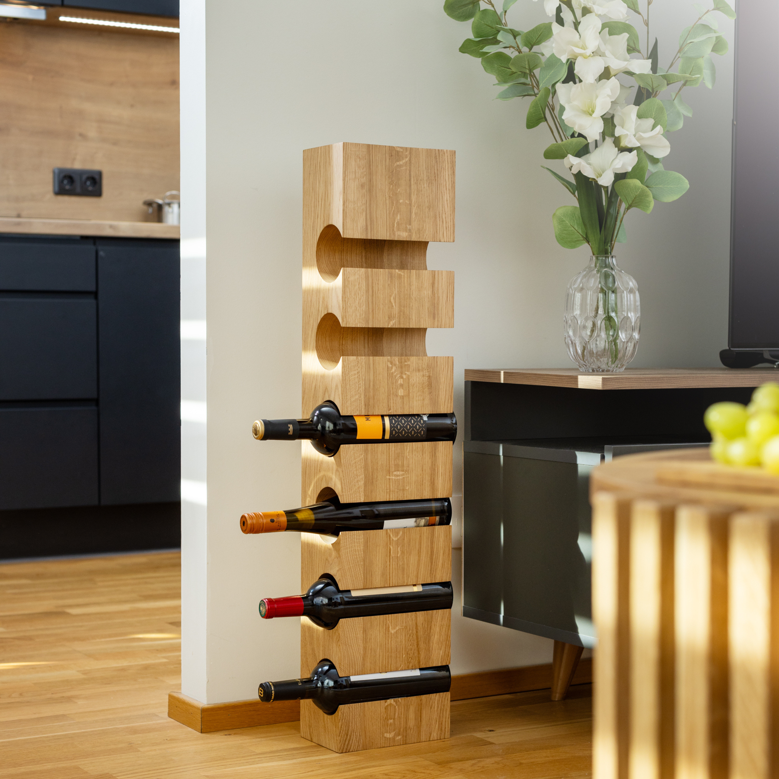 Solid wood wine rack VALGE for six bottles in a modern living room