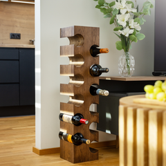 Solid wood wine rack PUNANE for twelve bottles in a modern living room