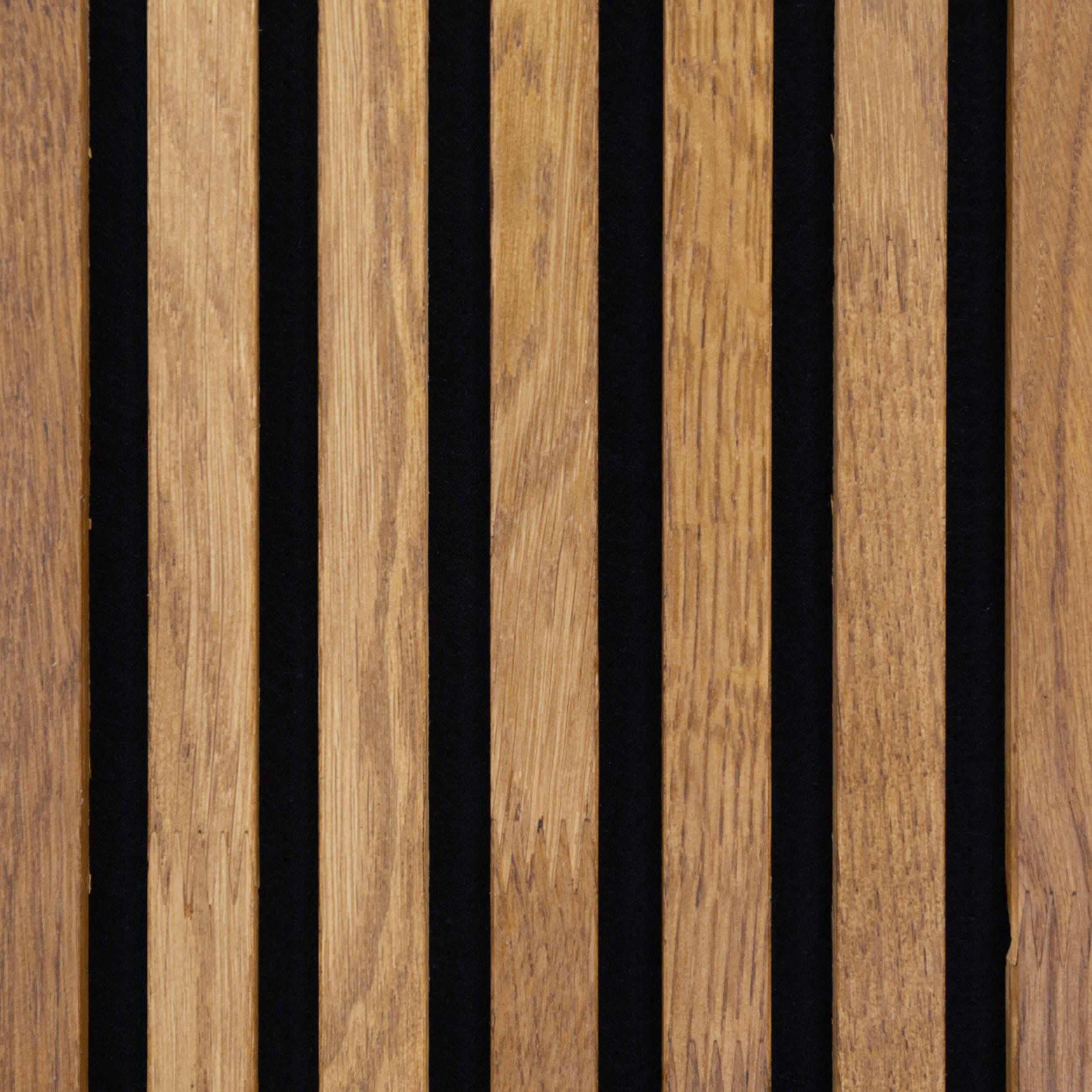 A close up shot of the wooden slatted wall showcasing the grain of solid wood